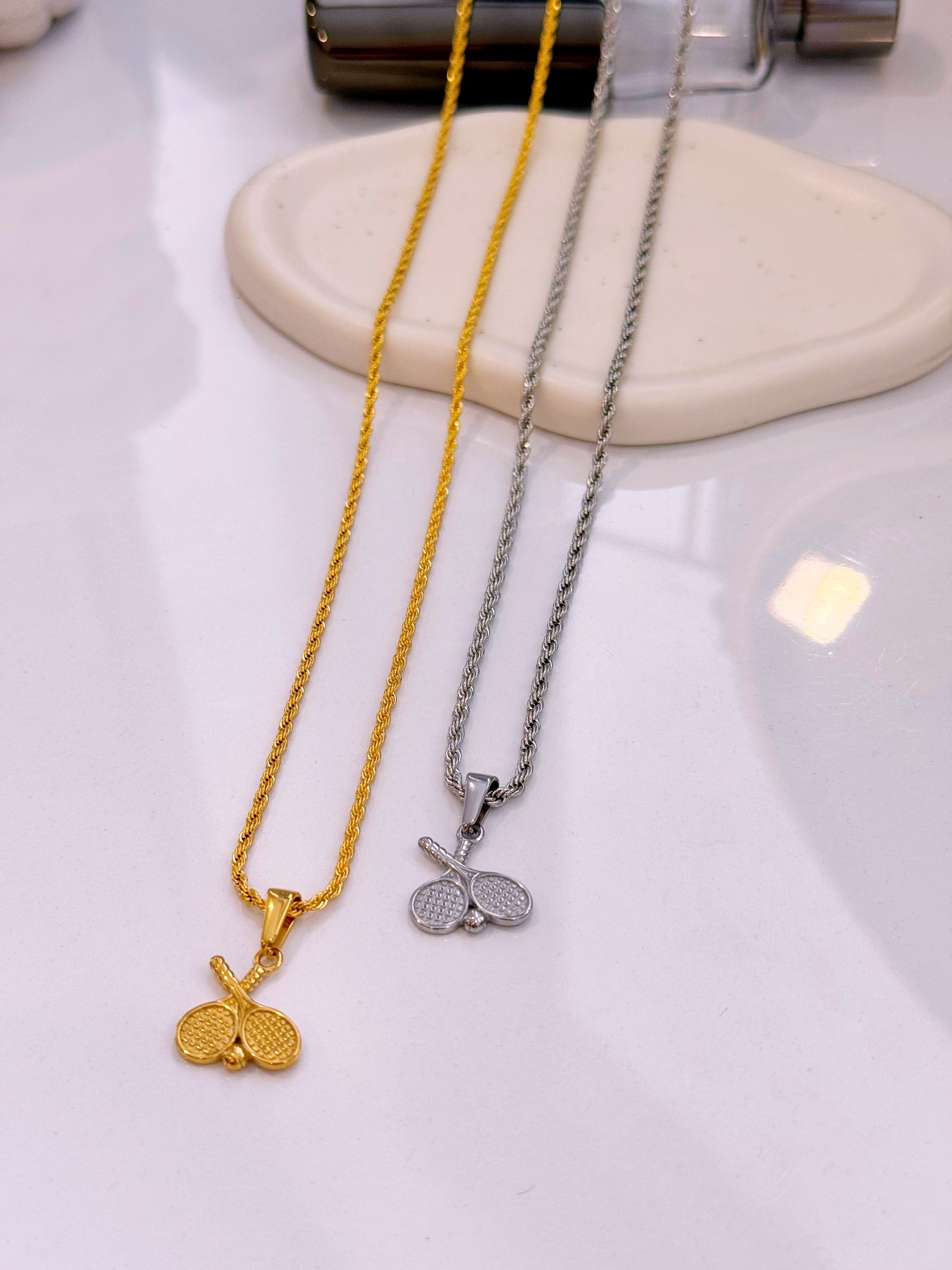 Colar raquetes em pendente | 2 Cores