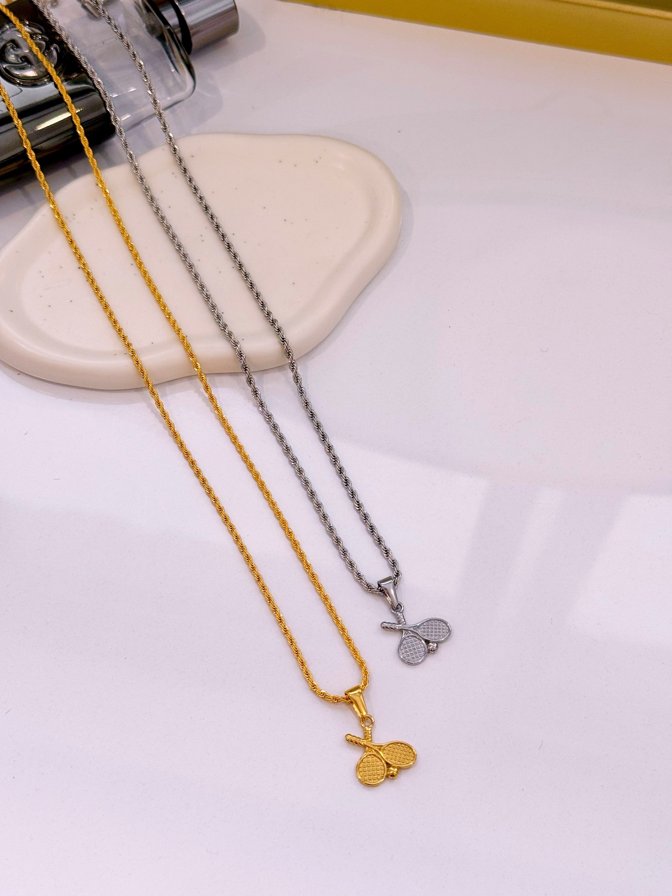 Colar raquetes em pendente | 2 Cores