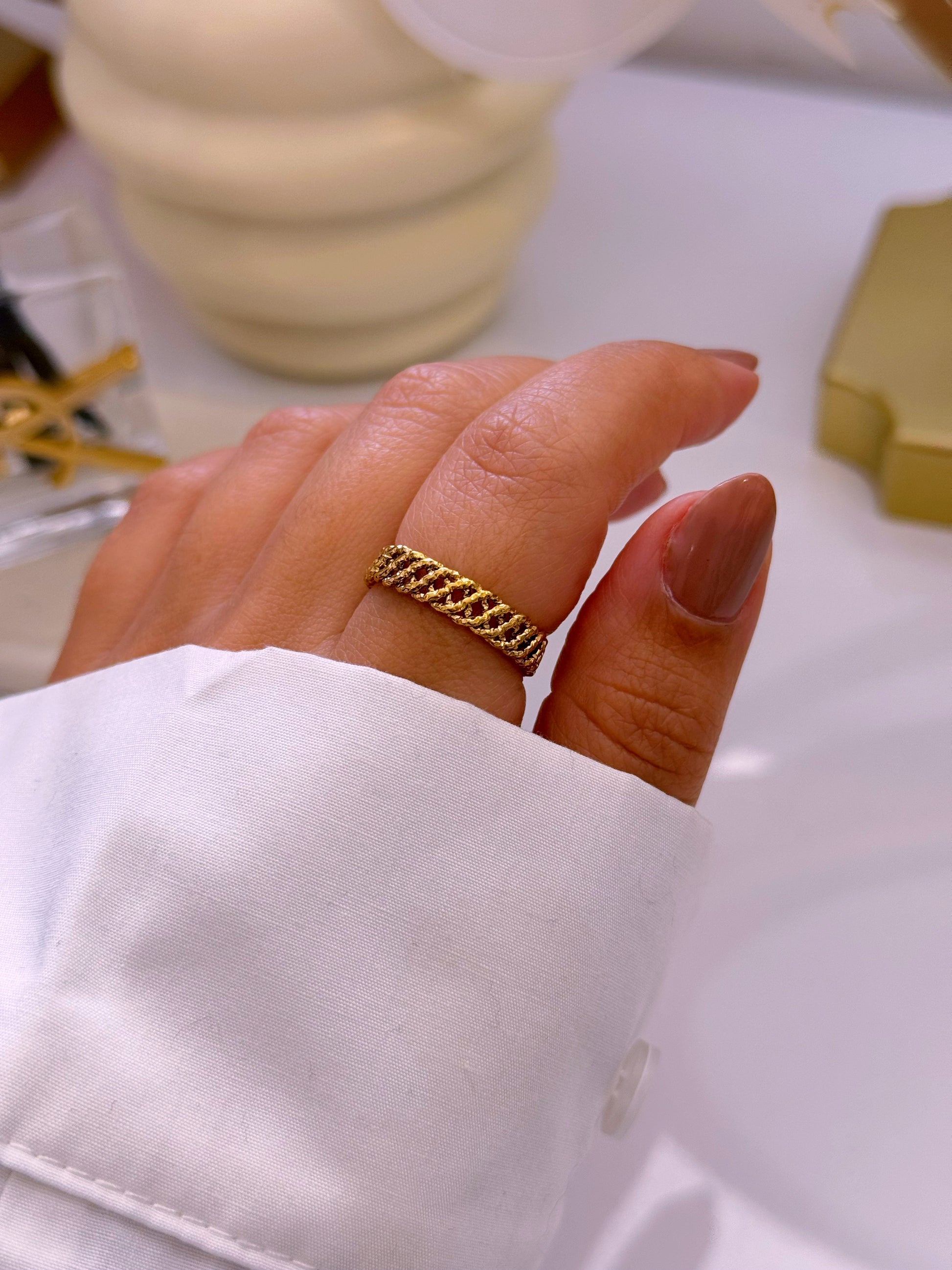 Anel ajustável com efeito entrelaçado | Dourado