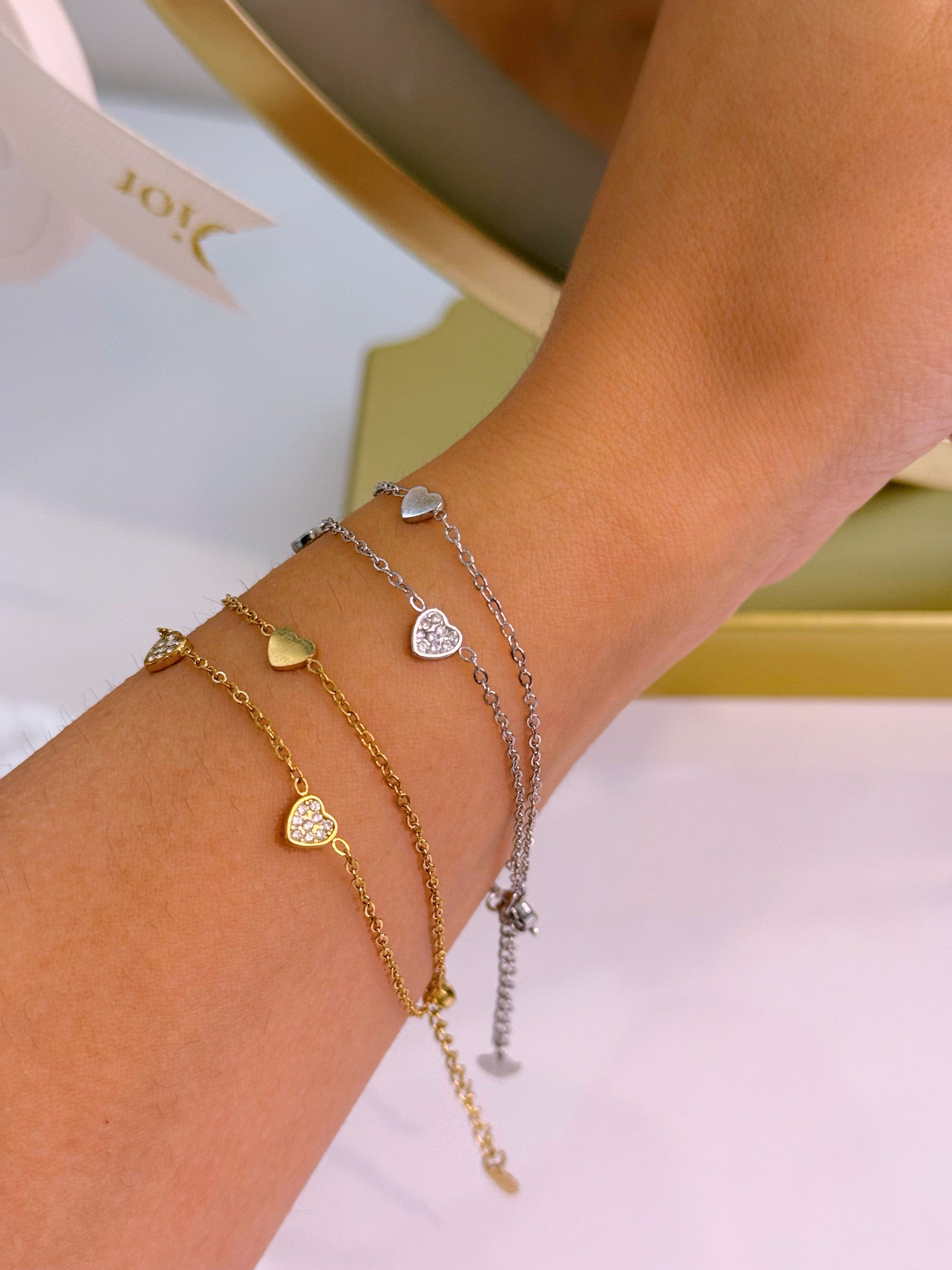 Pulseira efeito duplo com corações lisos e de brilhantes | 2 cores