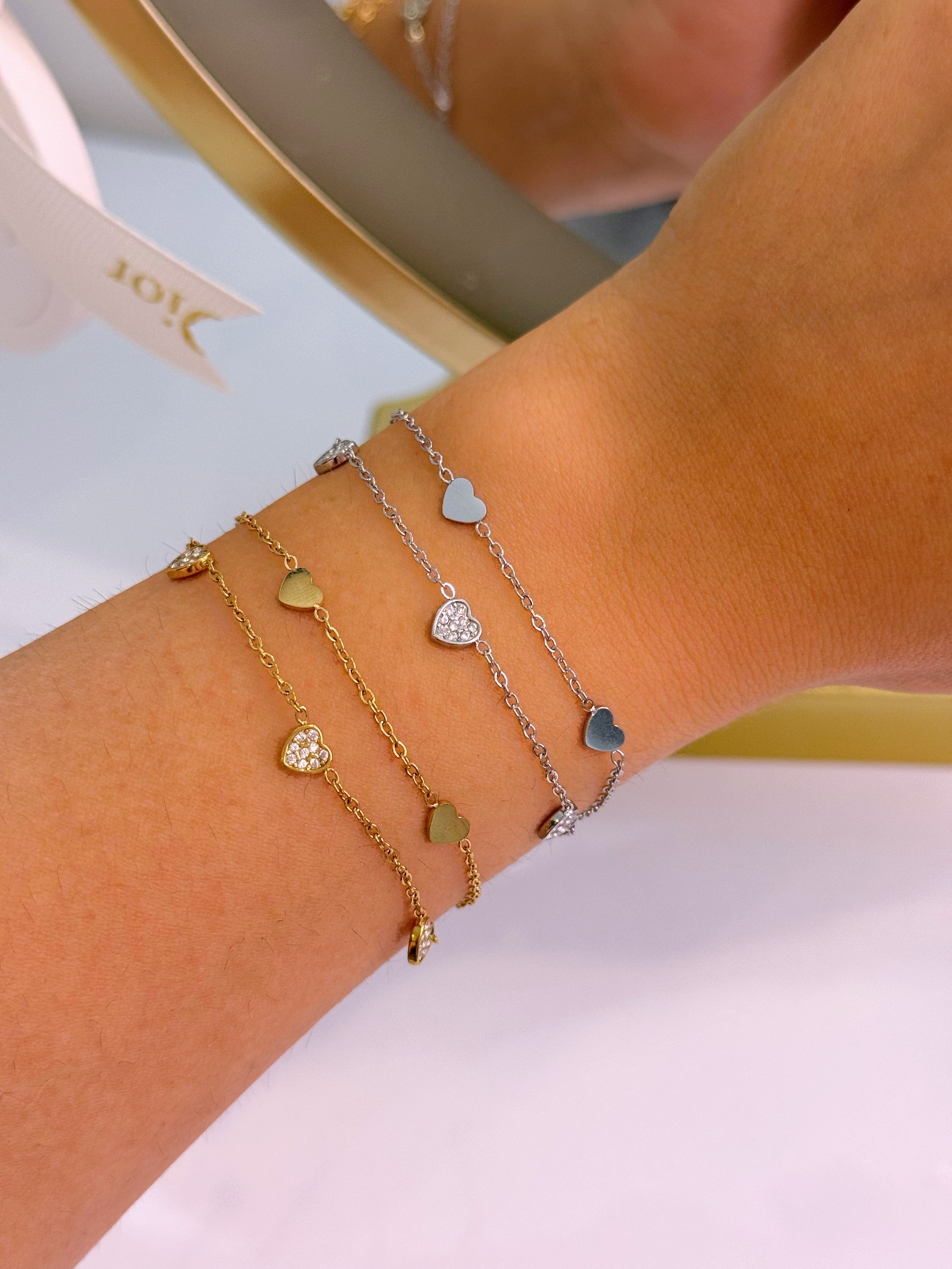 Pulseira efeito duplo com corações lisos e de brilhantes | 2 cores
