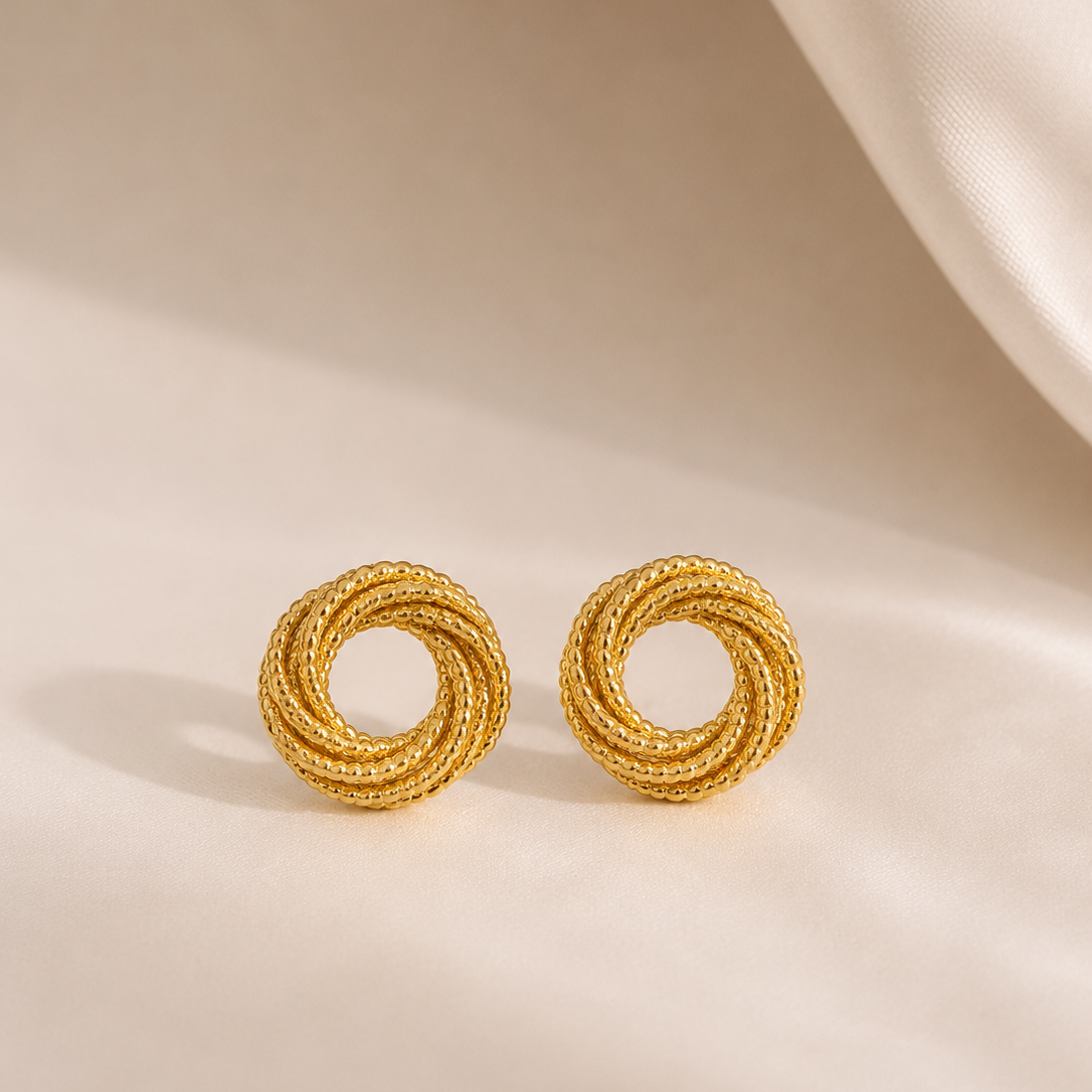 Brincos elegantes efeito nó entrelaçado | Dourado