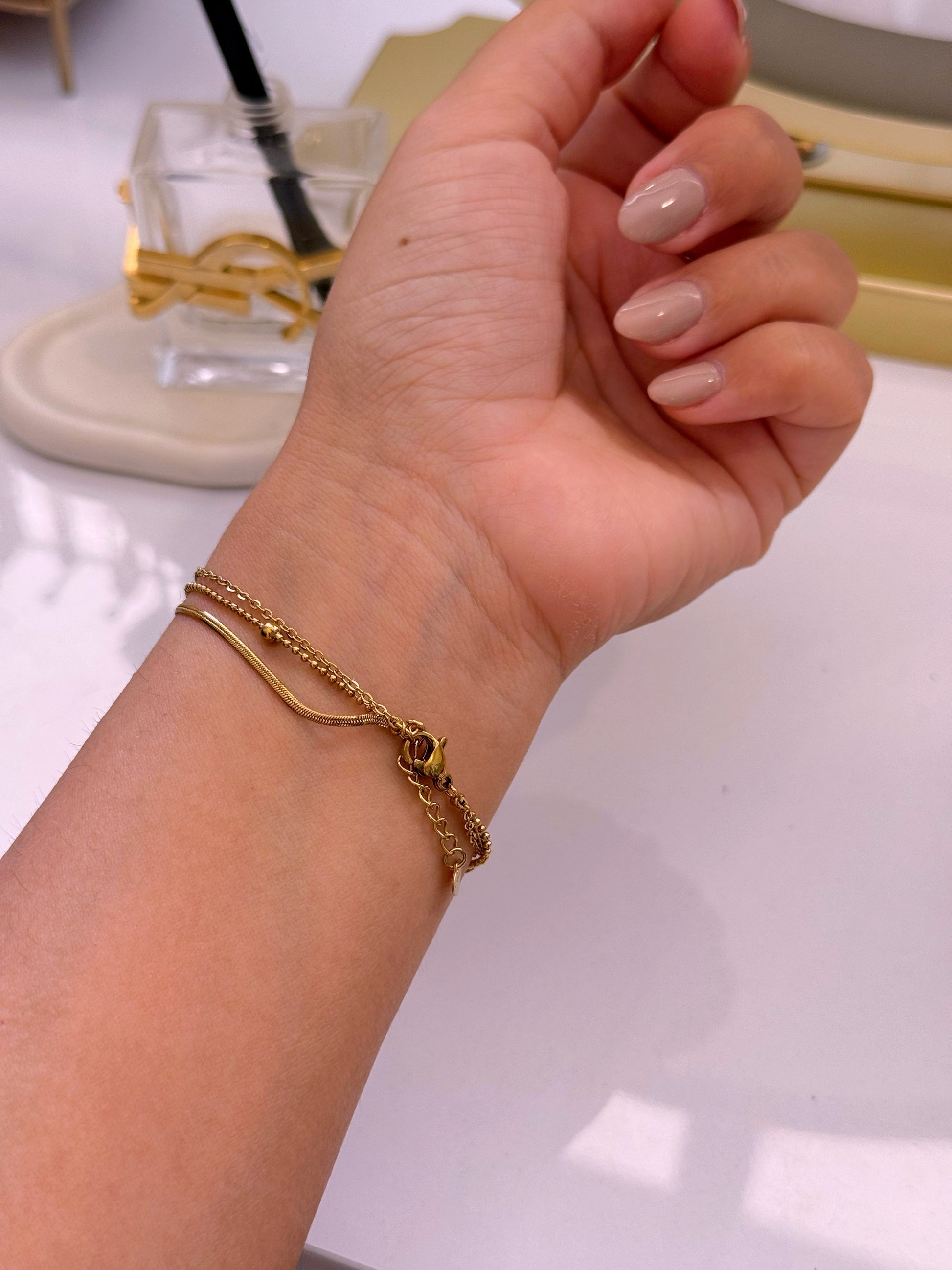 Pulseira efeito triplo • malha achatada com coração, fininha e fininha com bolinhas | Dourado