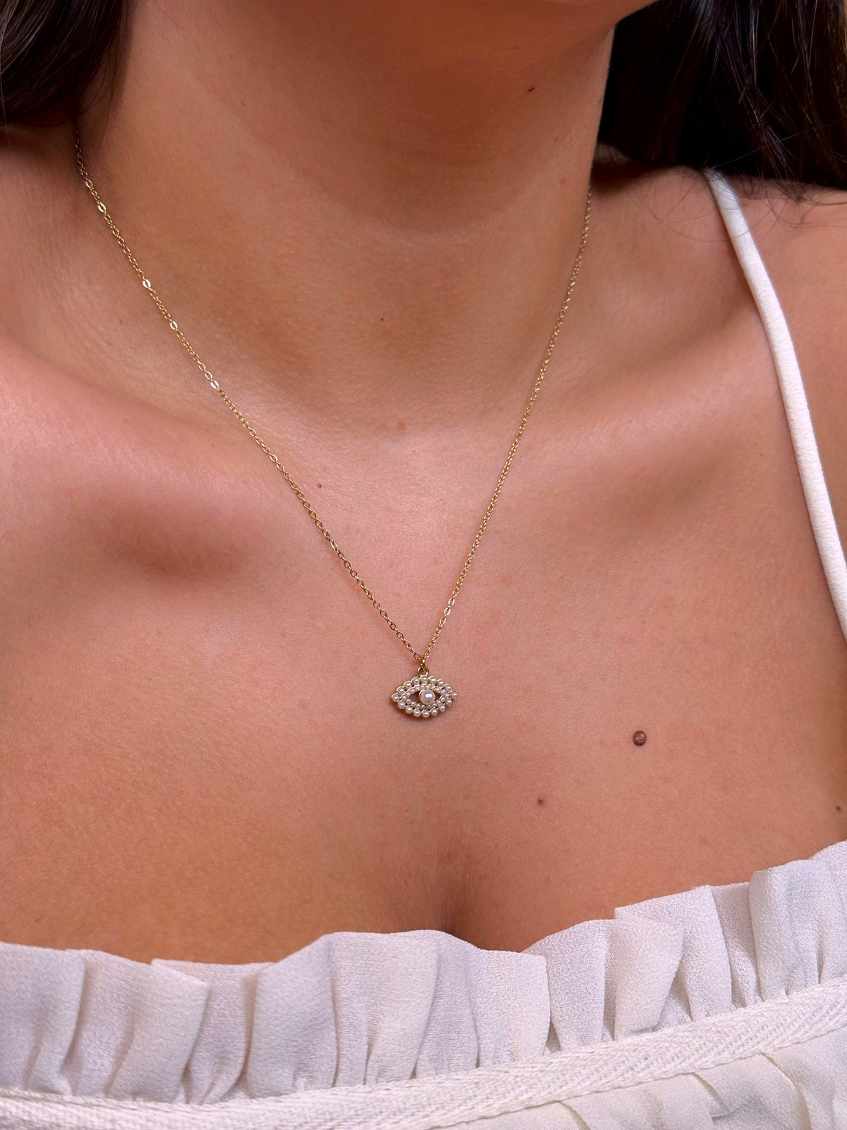 Colar olho grego preenchido com pérolas | Dourado
