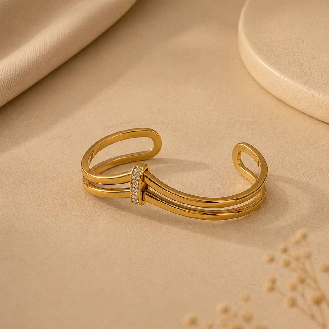 Pulseira rígida efeito duplo bico com brilhantes ao centro | Dourado