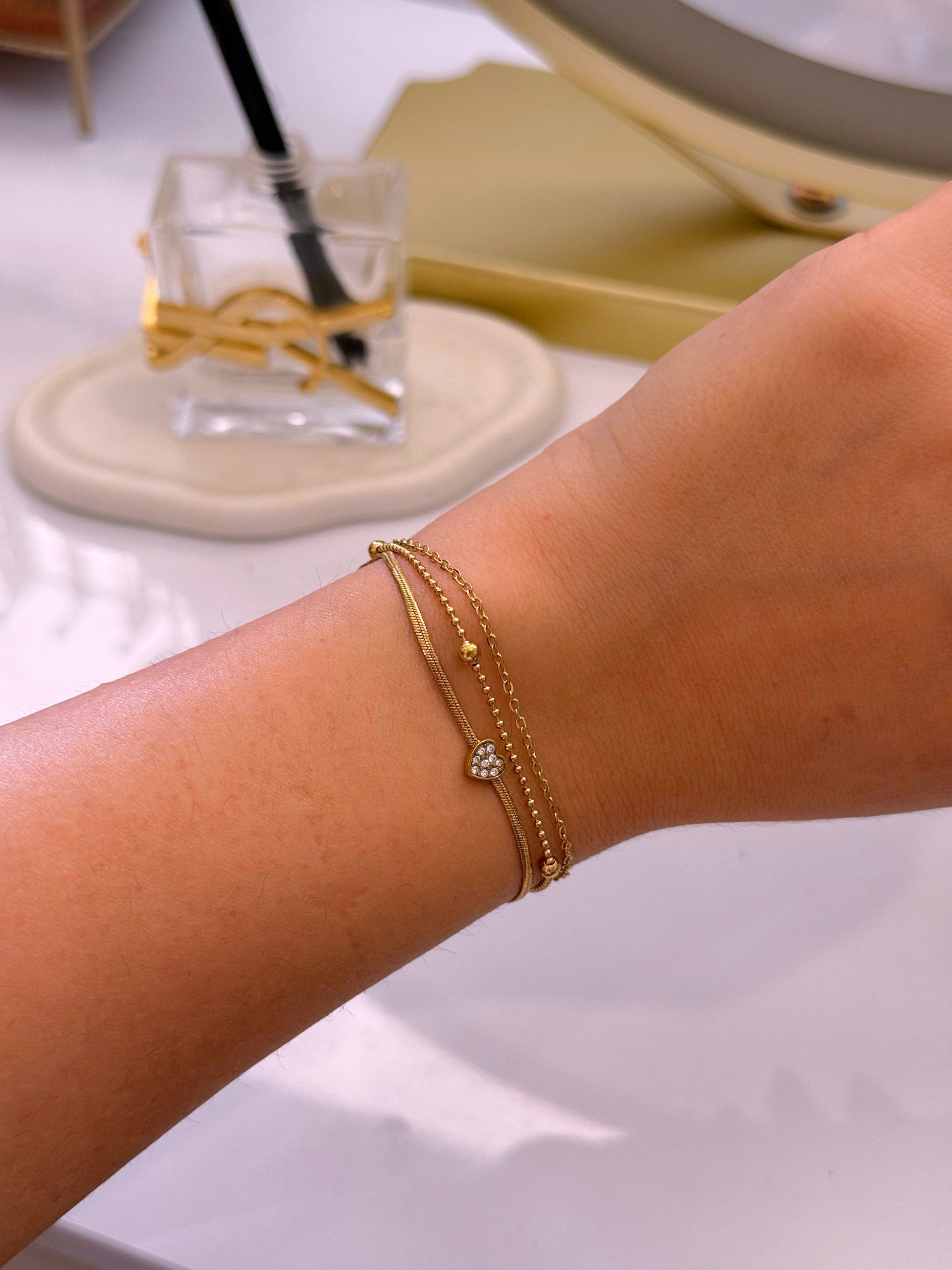 Pulseira efeito triplo • malha achatada com coração, fininha e fininha com bolinhas | Dourado