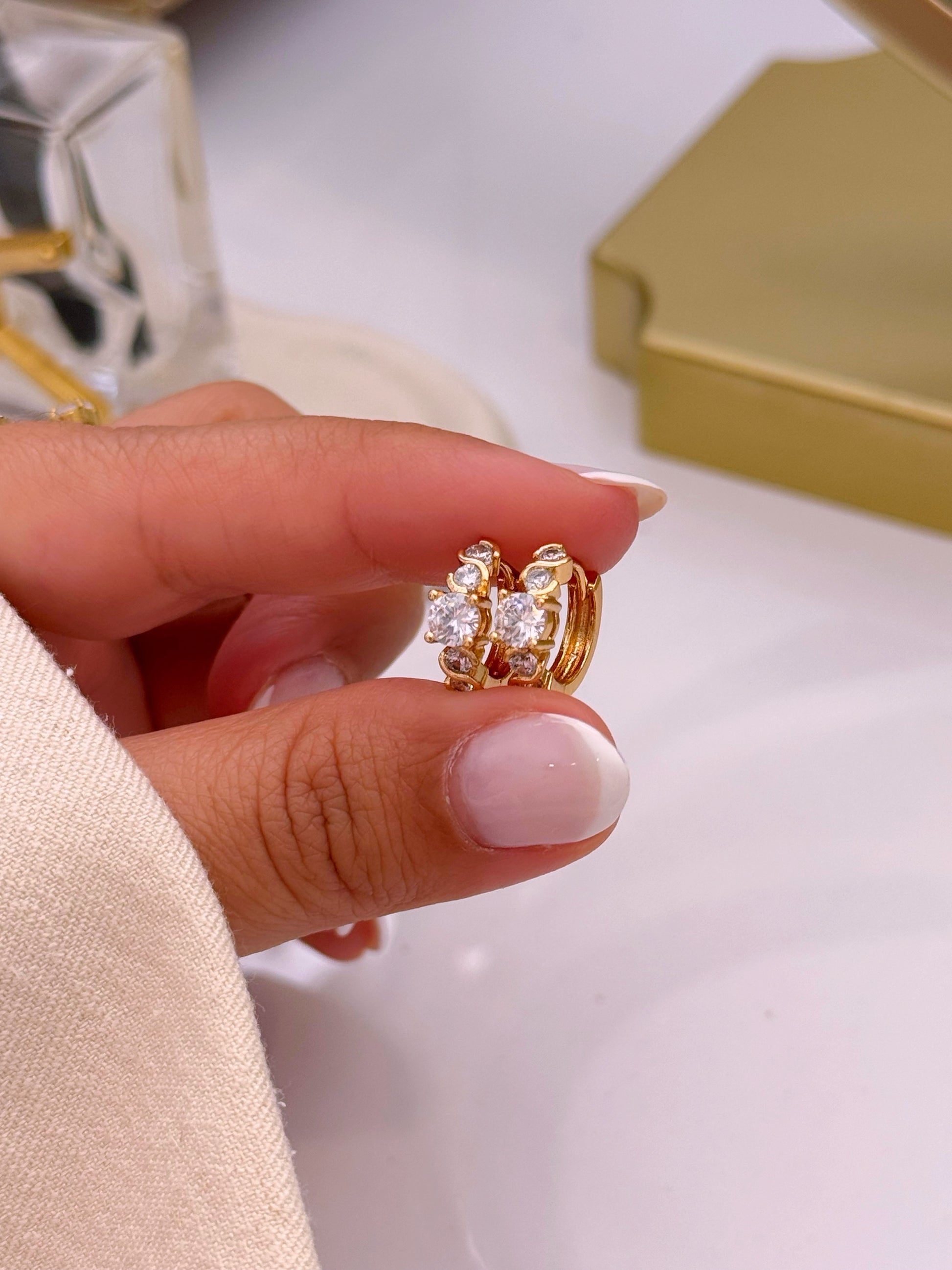 Argolinhas efeito torcido com brilhante ao centro | Rose Gold