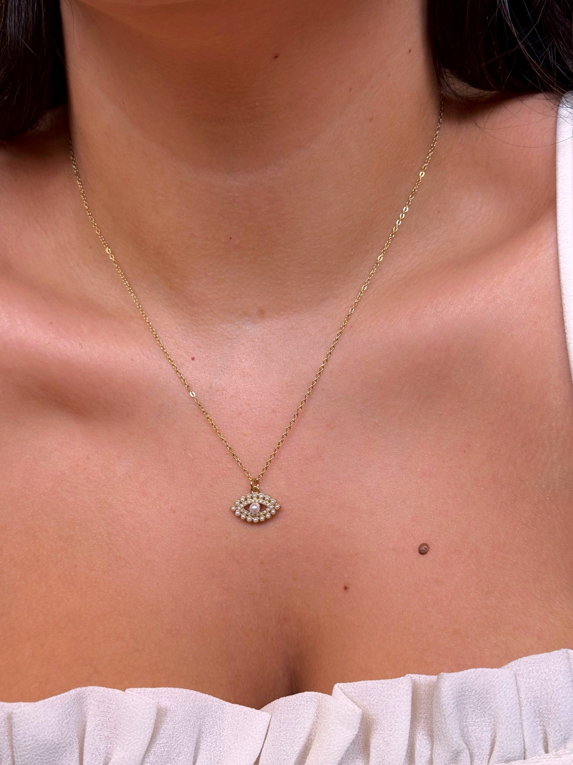 Colar olho grego preenchido com pérolas | Dourado