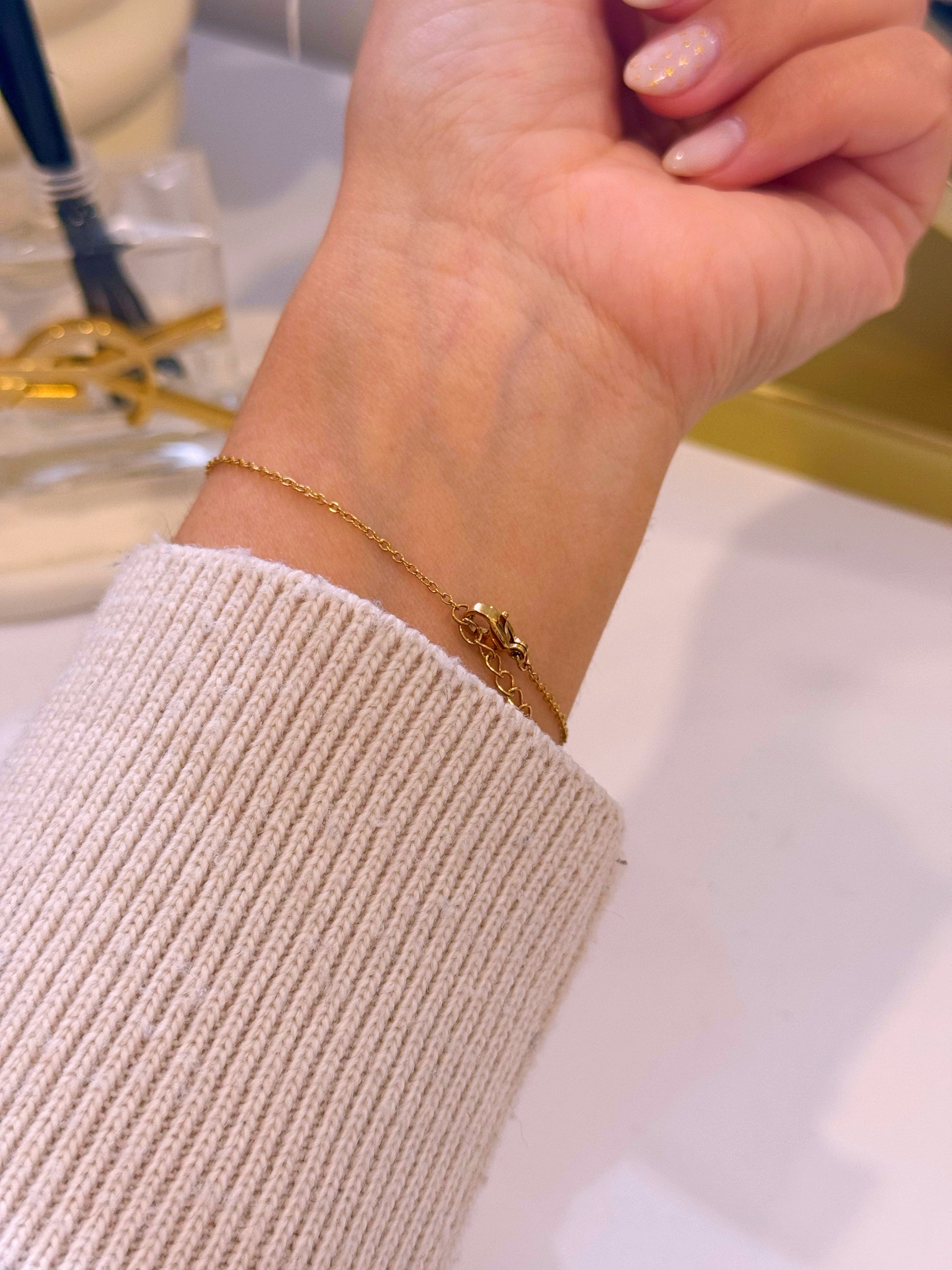 Pulseira elegante com ponto de luz | Dourado