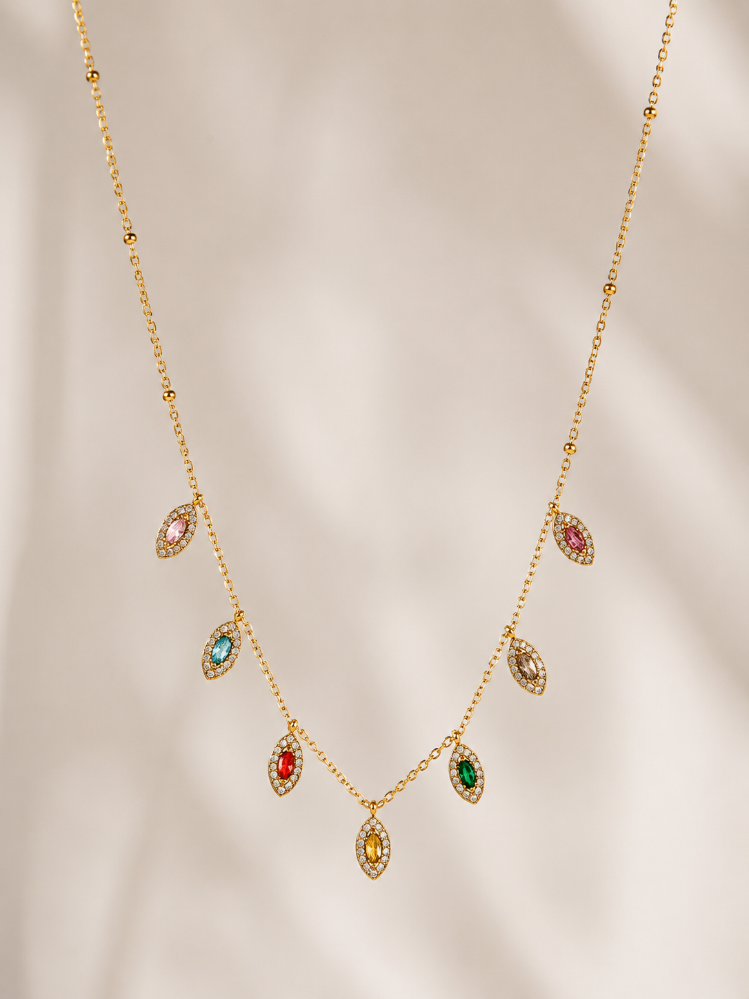 Colar olho grego com 7 brilhantes coloridos | Dourado