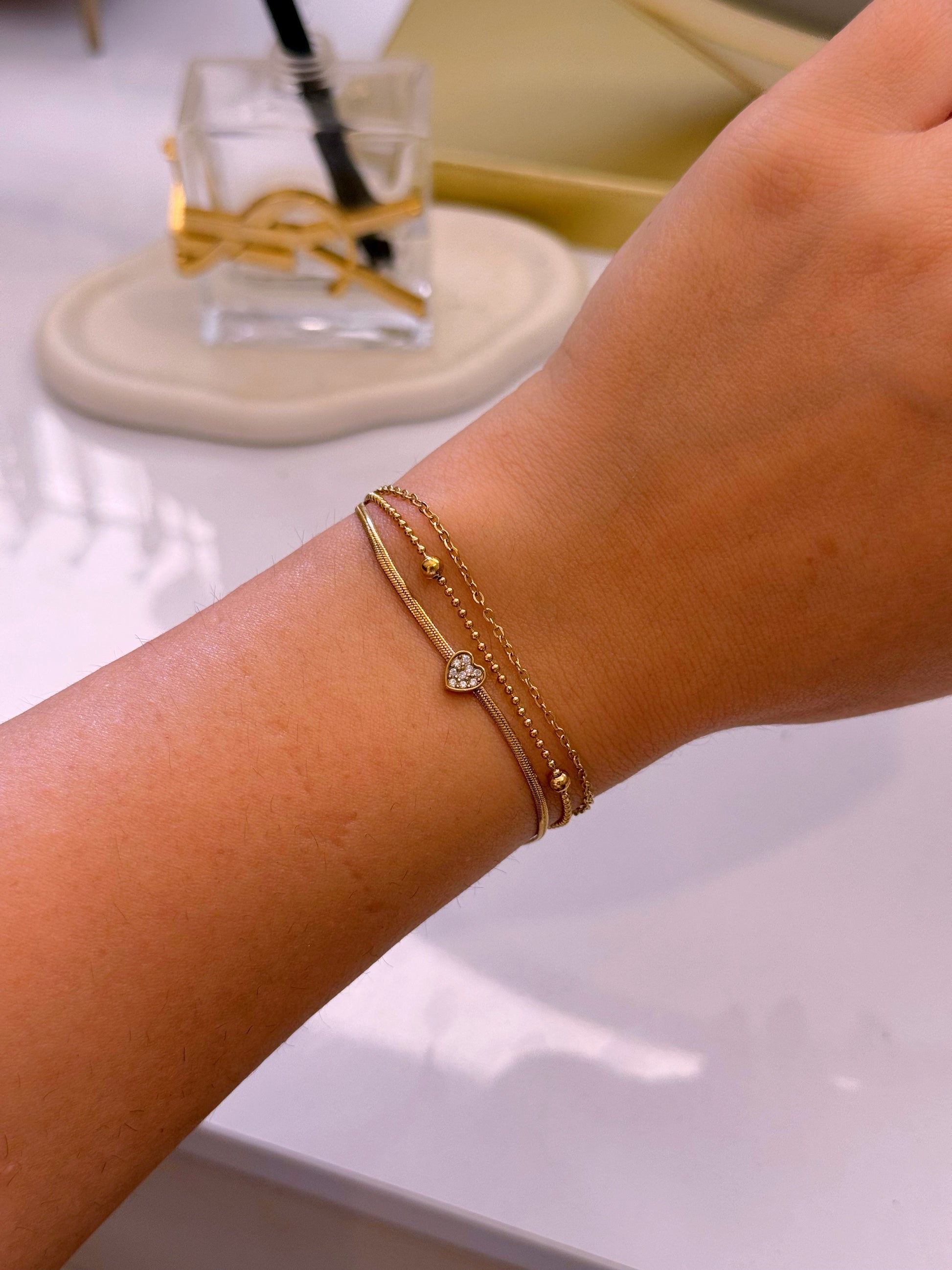 Pulseira efeito triplo • malha achatada com coração, fininha e fininha com bolinhas | Dourado