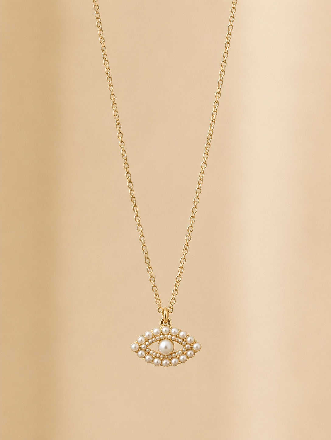 Colar olho grego preenchido com pérolas | Dourado