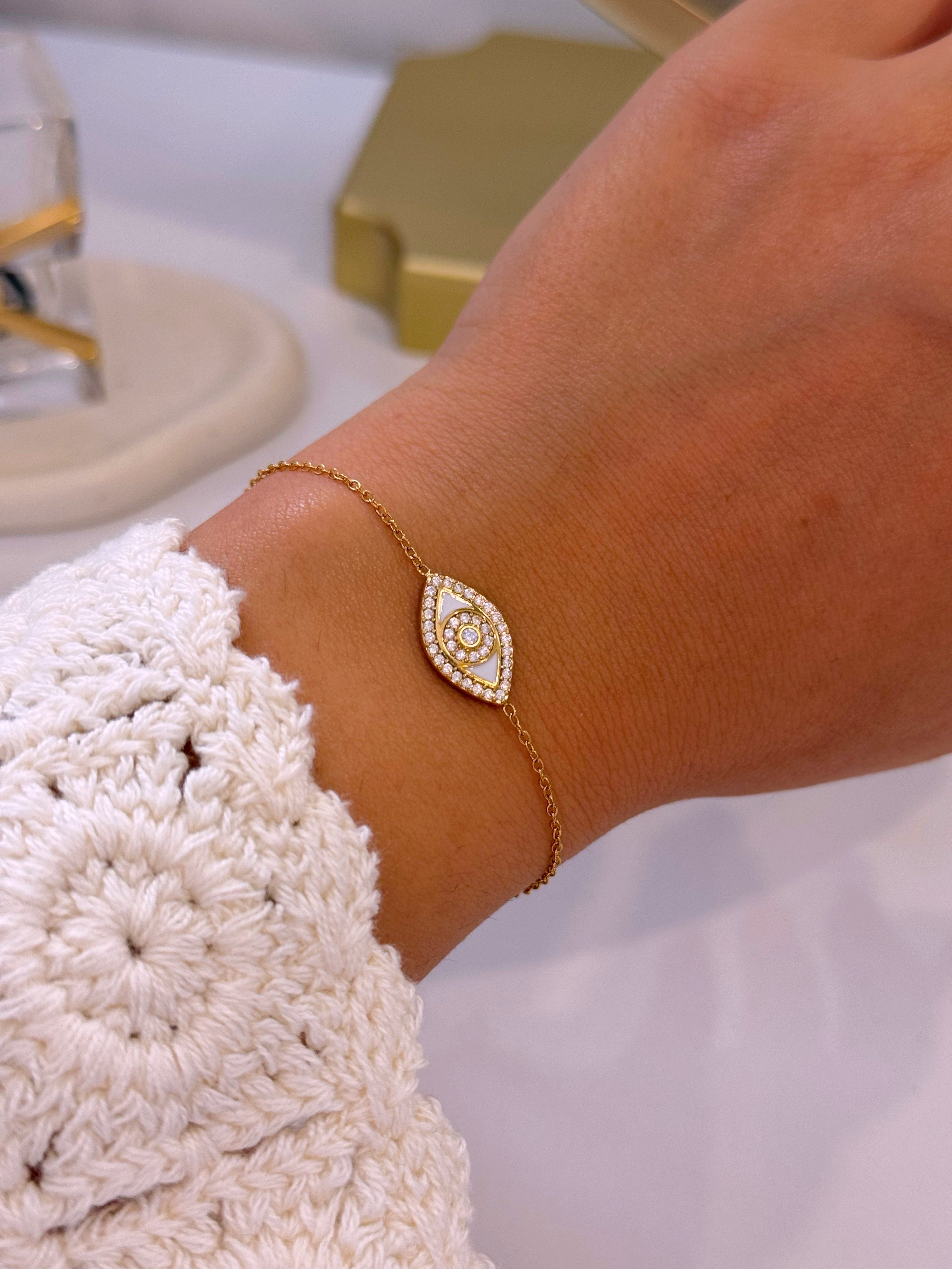 Pulseira olho grego com esmalte branco e brilhantes | Dourado