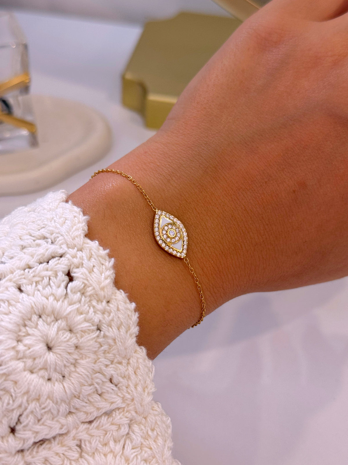 Pulseira olho grego com esmalte branco e brilhantes | Dourado