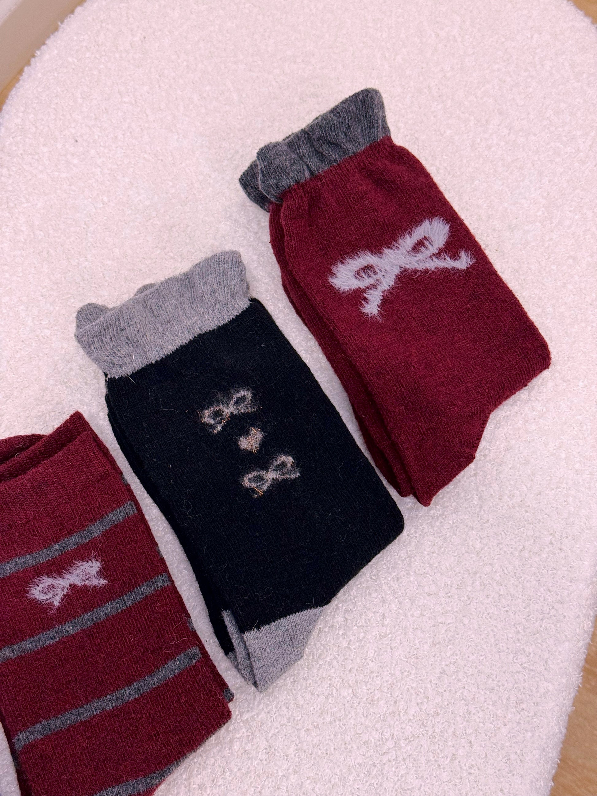 Meias de malha com lacinhos • em lã e caxemira | 4 cores