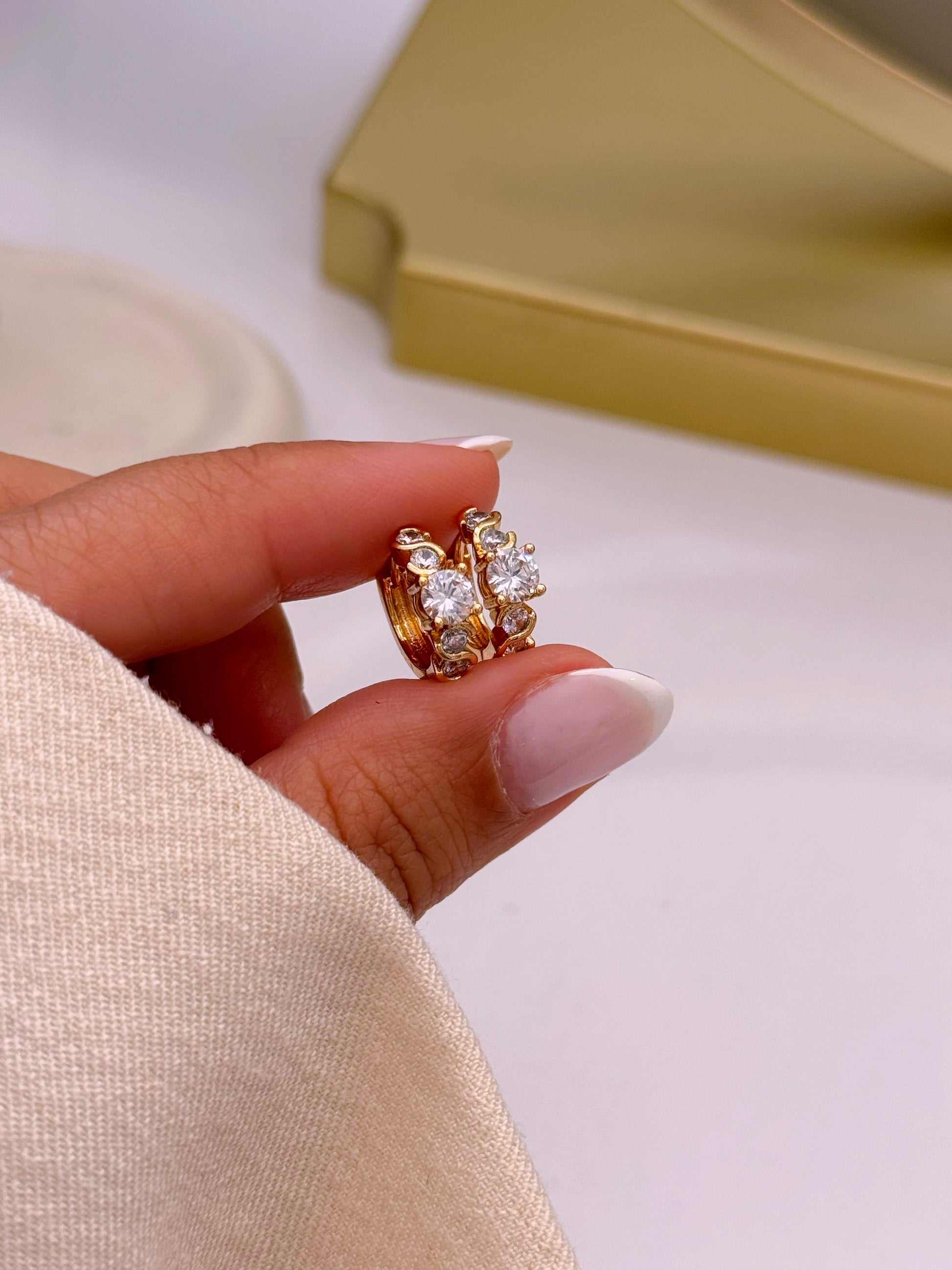 Argolinhas efeito torcido com brilhante ao centro | Rose Gold