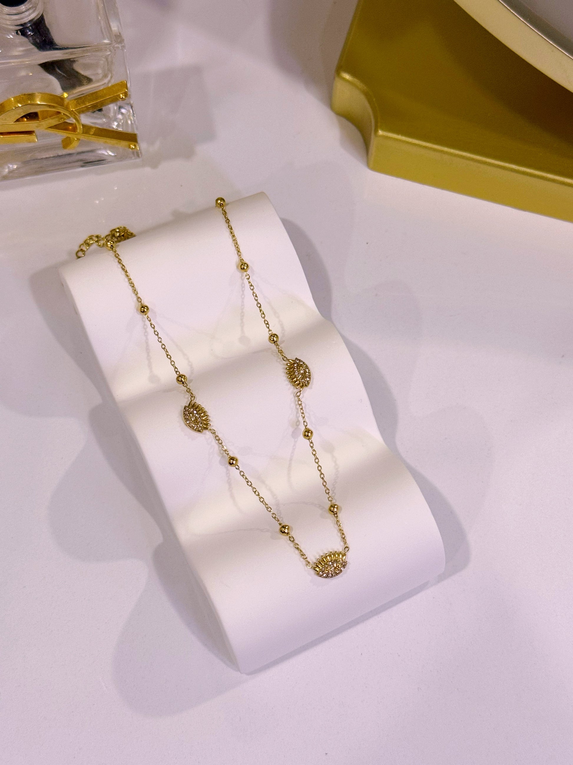 Colar com olho grego e brilhantes | Dourado