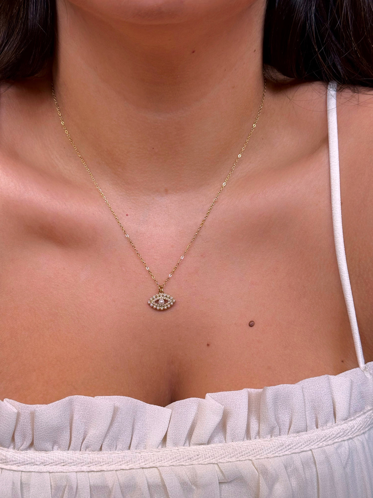 Colar olho grego preenchido com pérolas | Dourado