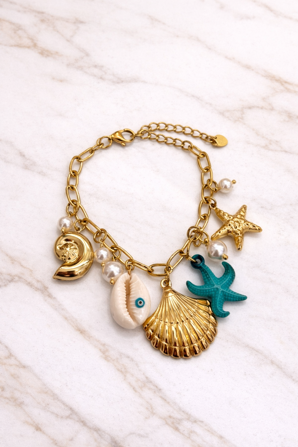 𝐄𝐝𝐢𝐜̧𝐚̃𝐨 𝐋𝐢𝐦𝐢𝐭𝐚𝐝𝐚 𝐕𝐞𝐫𝐚̃𝐨 🐚 Pulseira corrente com estrela do mar turquesa e vários pendentes | Dourado