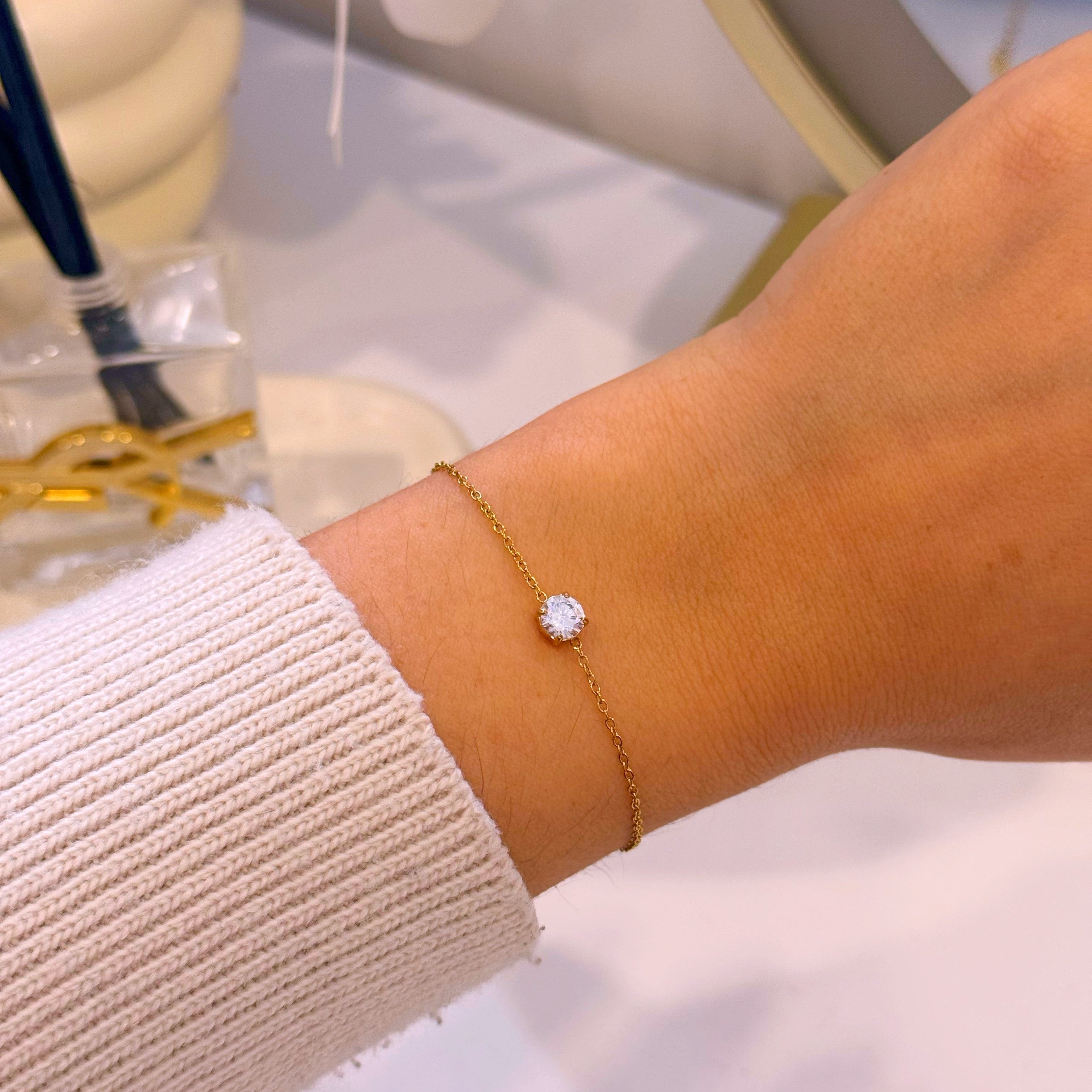 Pulseira elegante com ponto de luz | Dourado