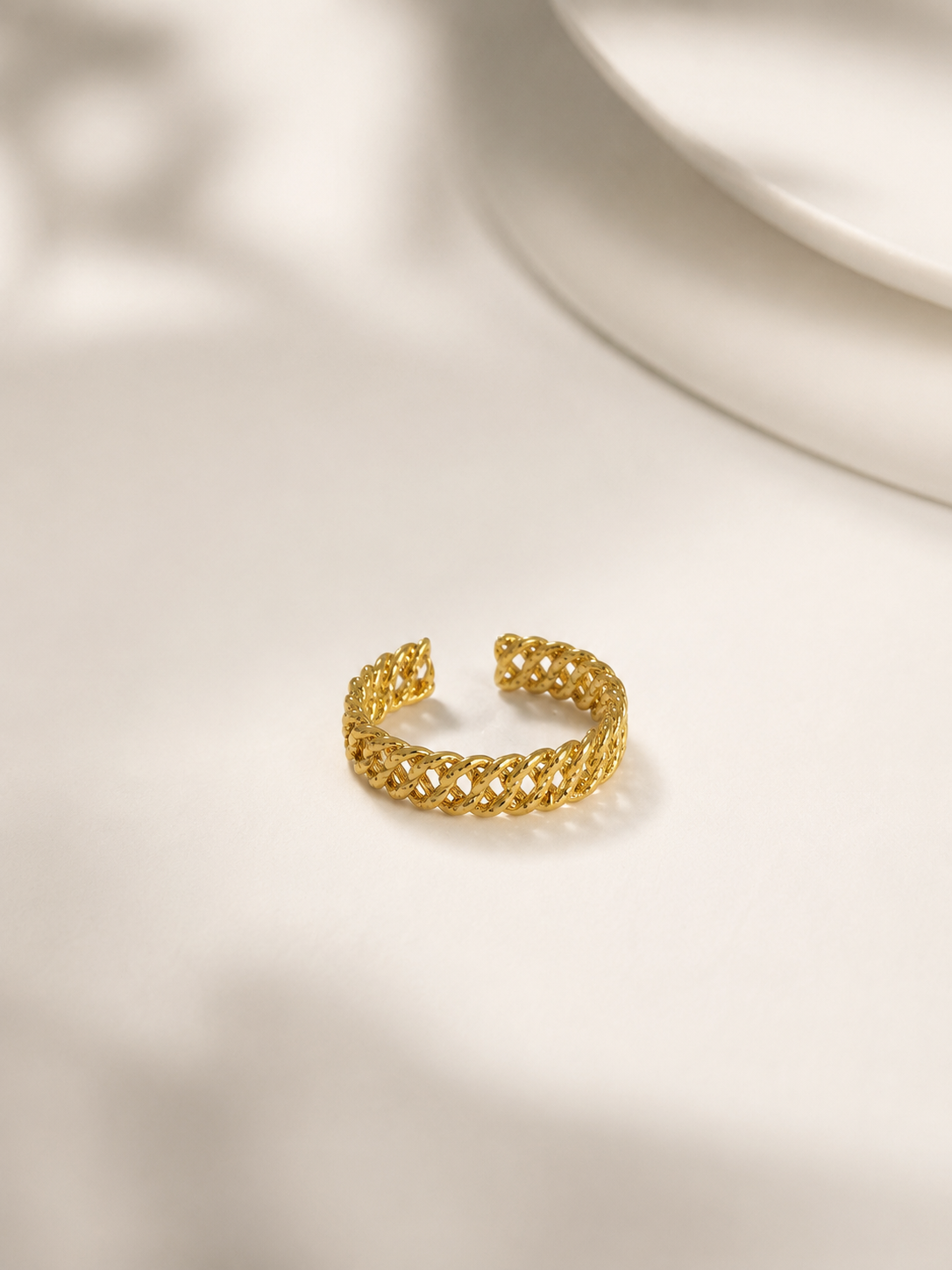 Anel ajustável com efeito entrelaçado | Dourado