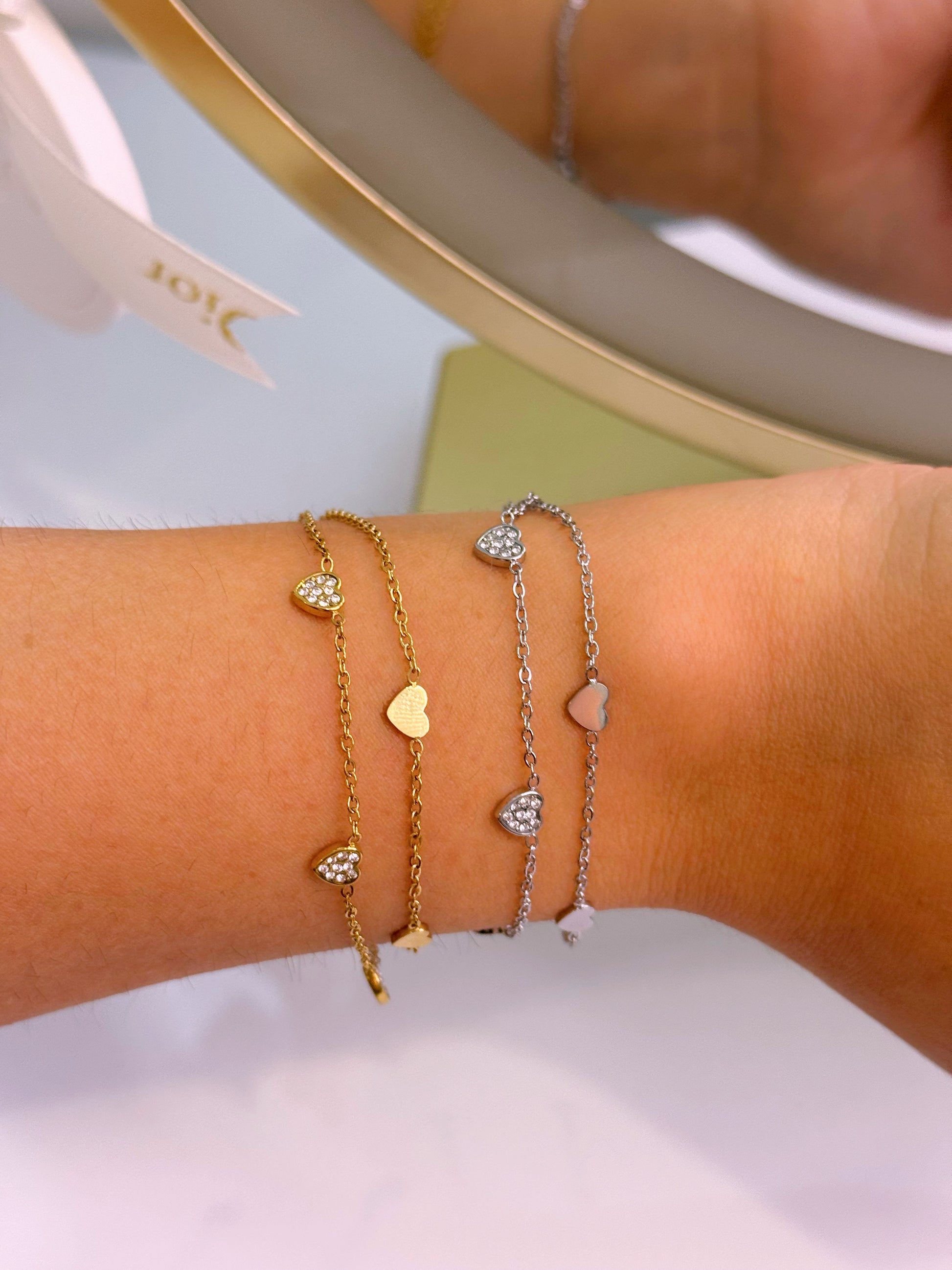 Pulseira efeito duplo com corações lisos e de brilhantes | 2 cores