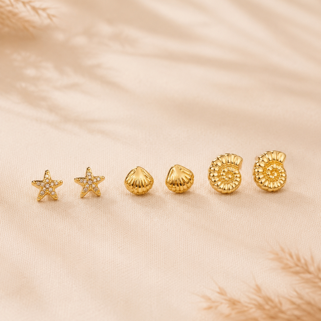 Conjunto de 6 brincos conchinha , estrelinha e búzio | Dourado em aço inoxidável