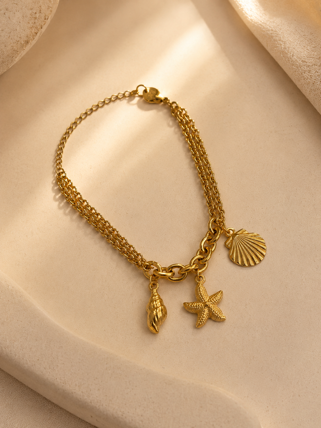 𝐄𝐝𝐢𝐜̧𝐚̃𝐨 𝐋𝐢𝐦𝐢𝐭𝐚𝐝𝐚 𝐕𝐞𝐫𝐚̃𝐨 🐚 Pulseira correntes com concha, estrela e búzio | Dourado