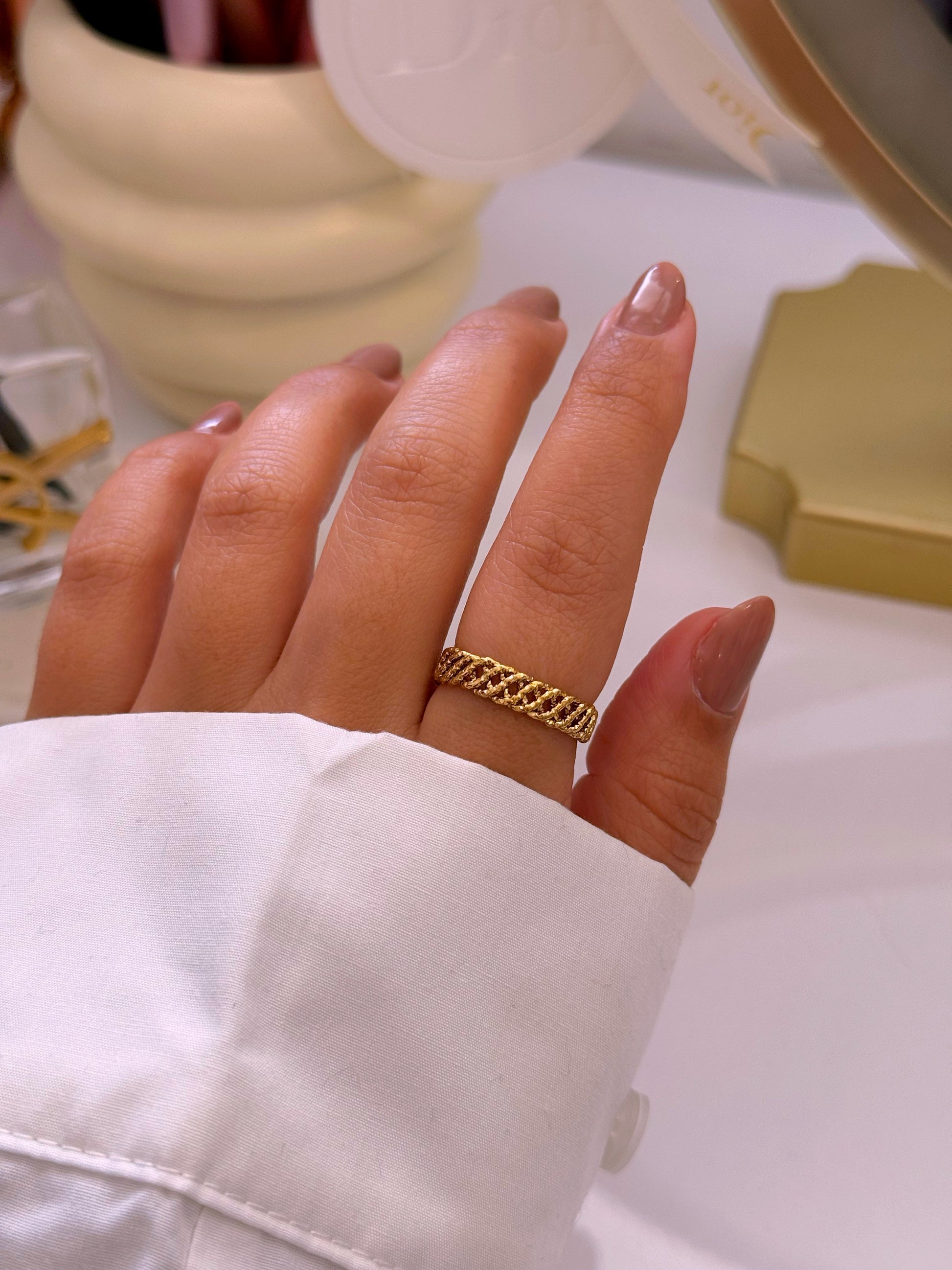 Anel ajustável com efeito entrelaçado | Dourado