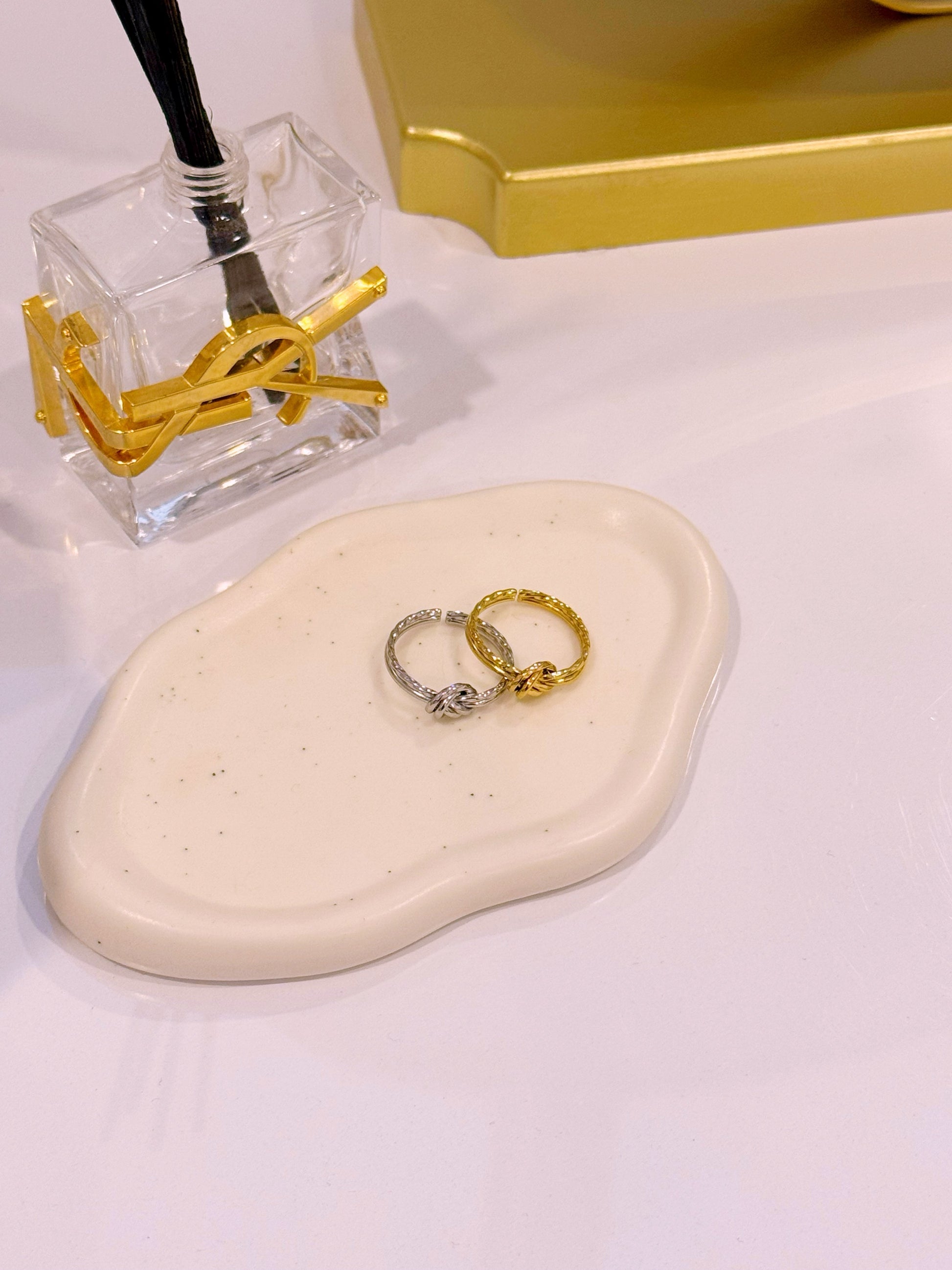 Anel ajustável com efeito de nó | 2 Cores